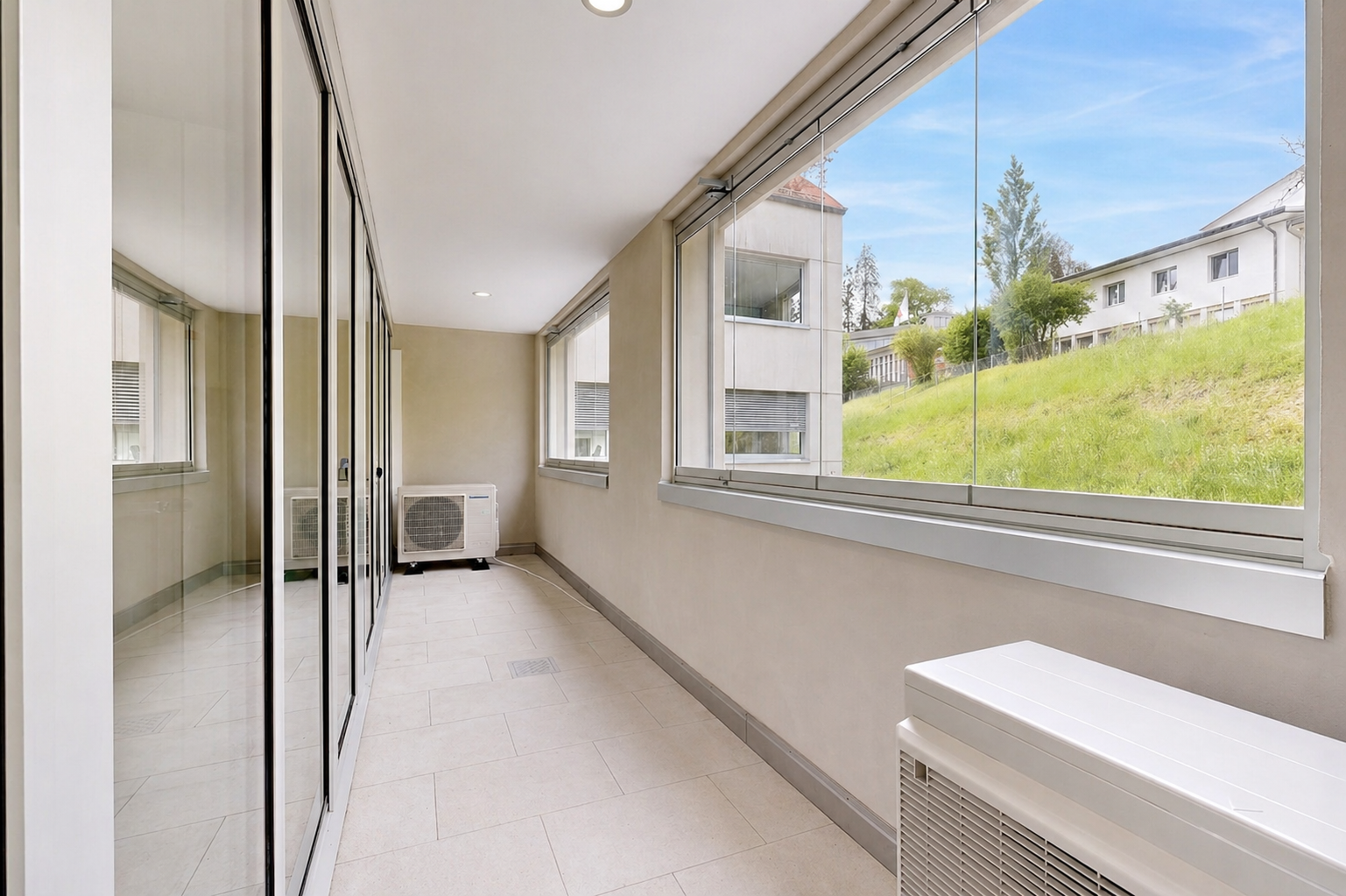 terrace with a sunroom and radiator