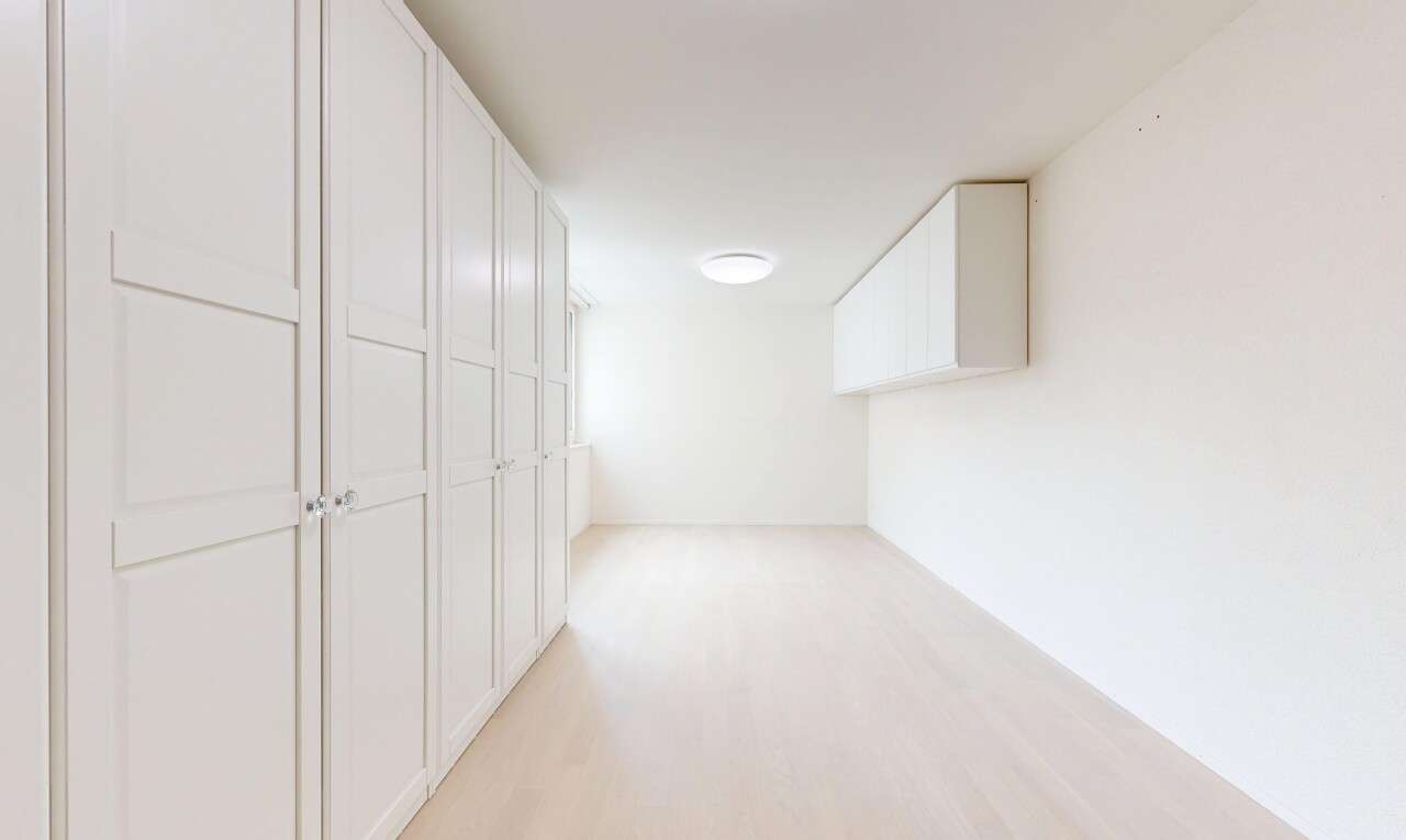 spare room with light wood-style floors