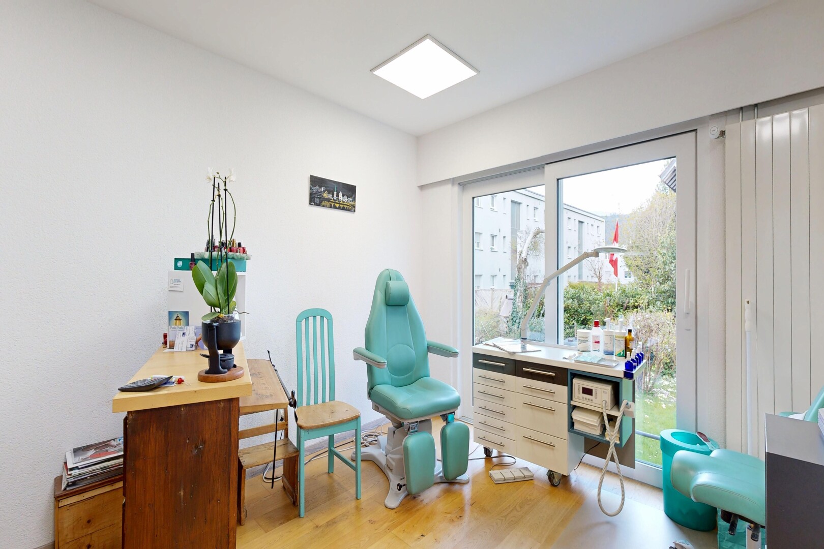 office with light wood-style flooring