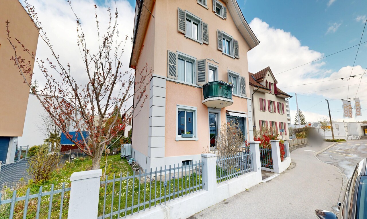 view of property featuring a fenced front yard