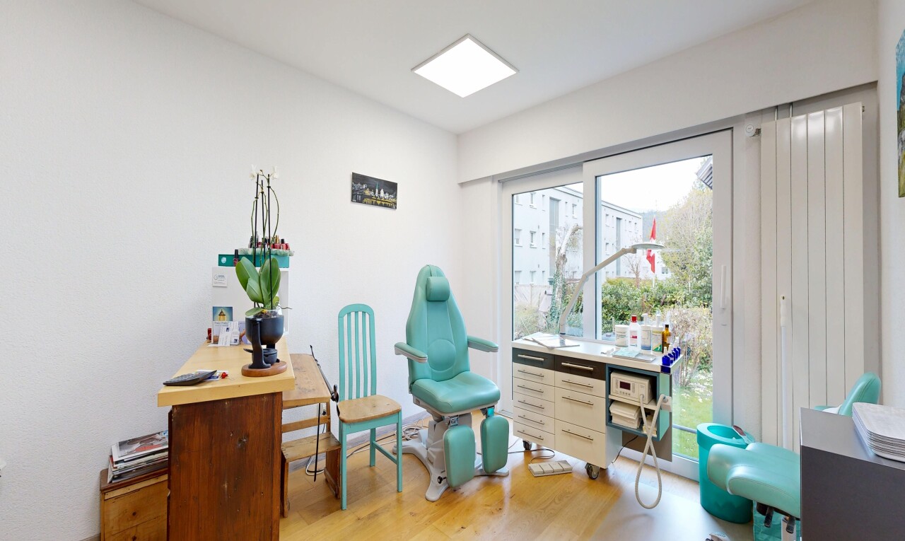 office with light wood-style flooring