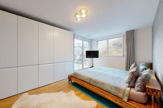 room / bedroom with light wood-style floors and access to exterior