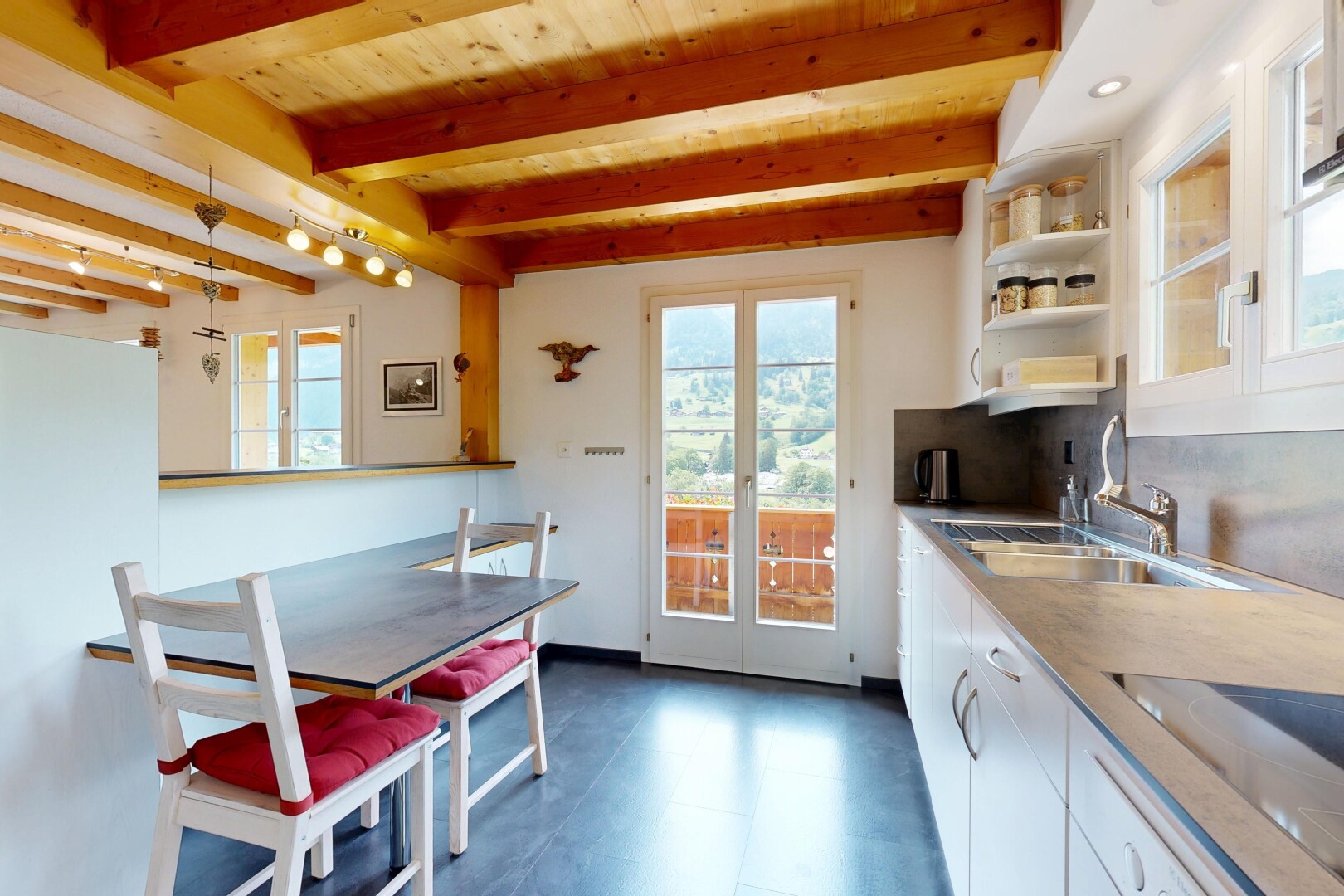 küche mit natural light, natürliches licht, inside property, beamed ceiling, und balkendecke