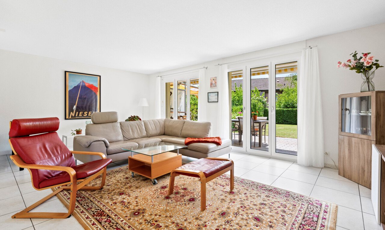 living area with light tile patterned flooring
