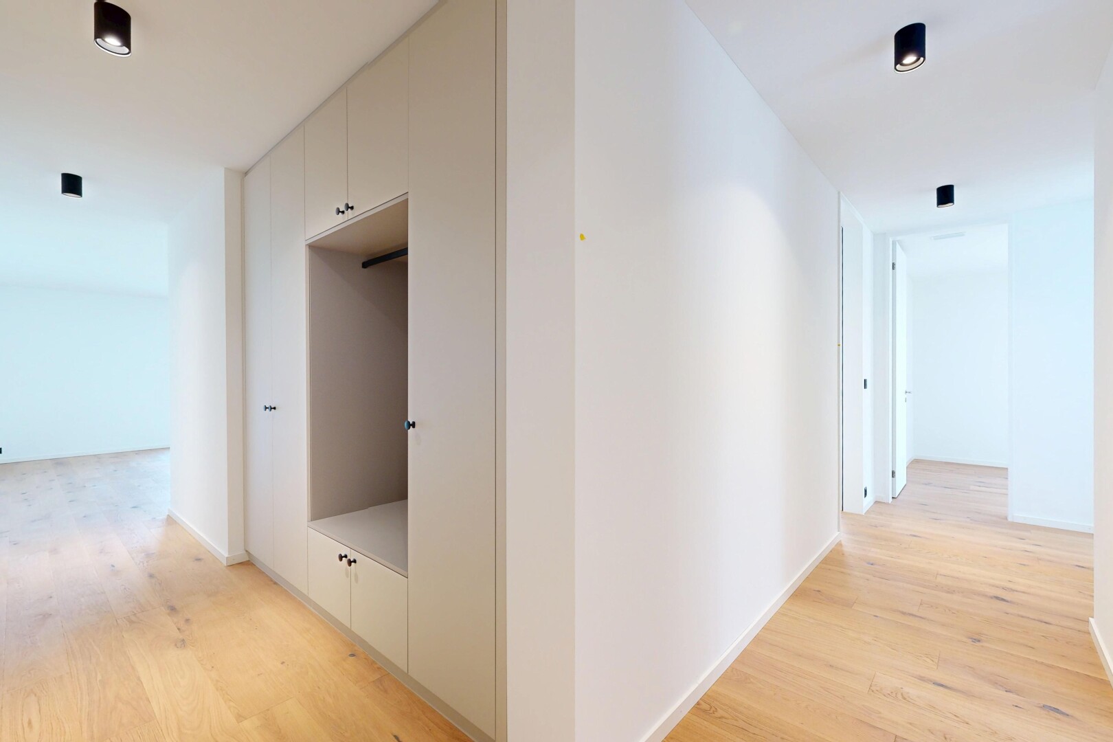 hallway with light wood-type flooring