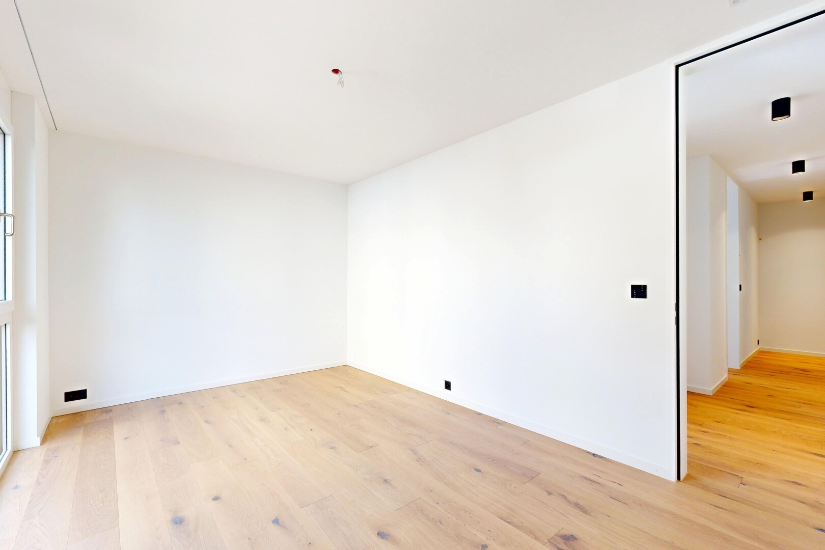 spare room with light wood-style flooring
