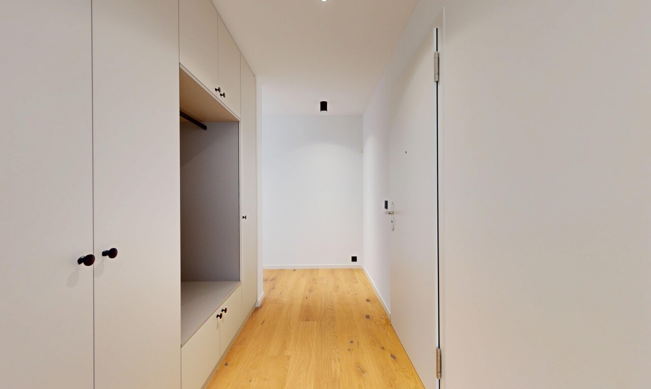 hallway featuring light wood finished floors