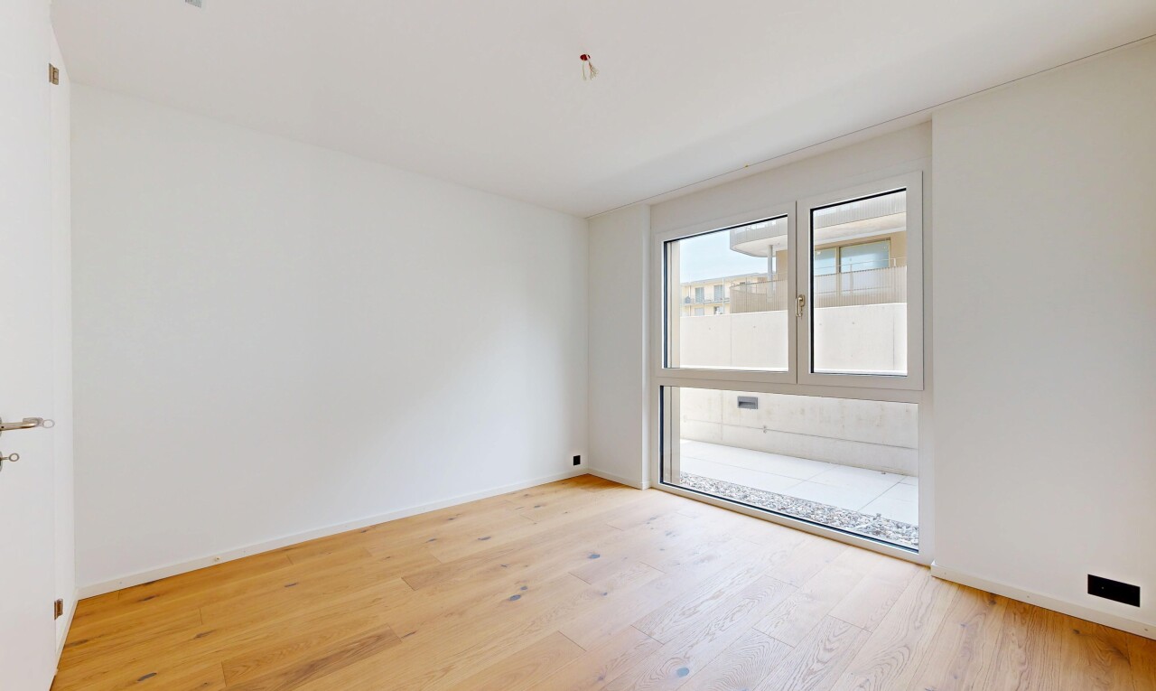 unfurnished room with light wood-type flooring