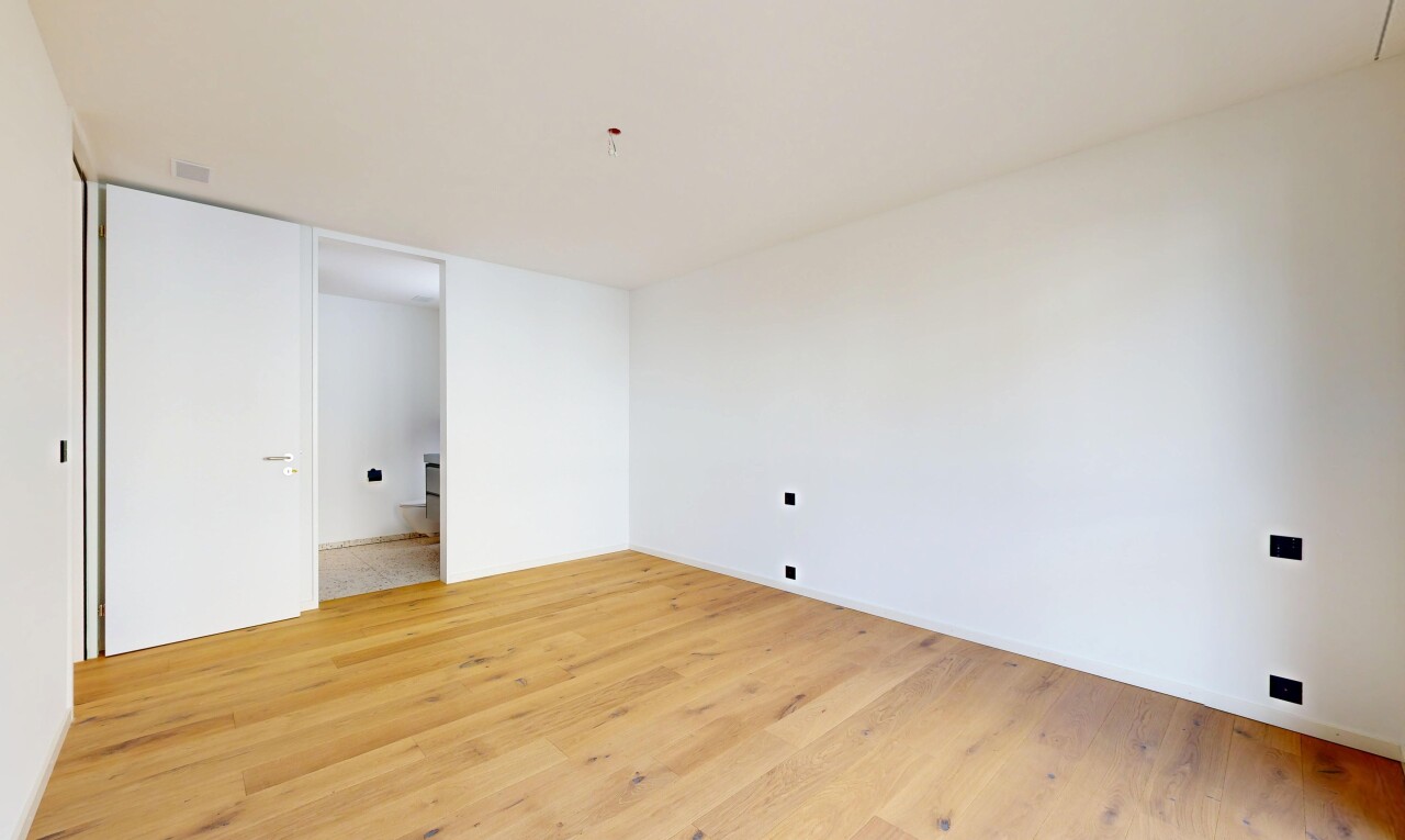 spare room featuring light wood-type flooring