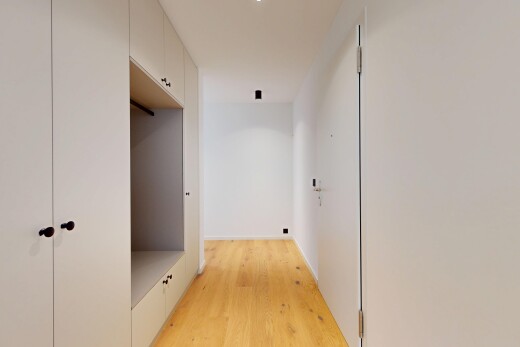 hallway featuring light wood finished floors