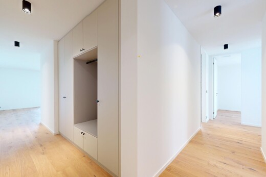 hallway with light wood-type flooring