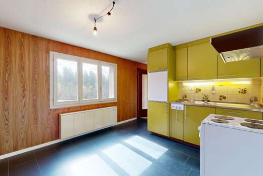 küche mit holzwand, wood wall, kühler, inside property, und natürliches licht