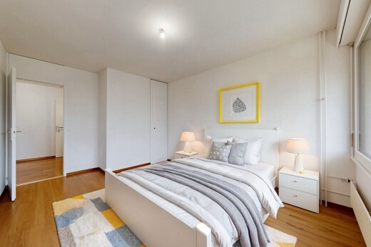 zimmer / schlafzimmer mit wood finish floor, holzfußboden, drywall, gipskartonwand, und virtually staged