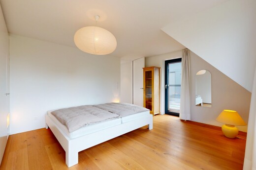 chambre avec cloison sèche, drywall, sol en finition bois, wood finish floor, et inside property