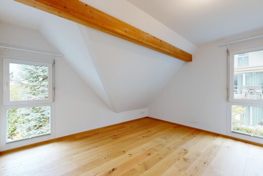 leerer raum mit zusätzliches zimmer, drywall, gipskartonwand, wood finish floor, und holzfußboden