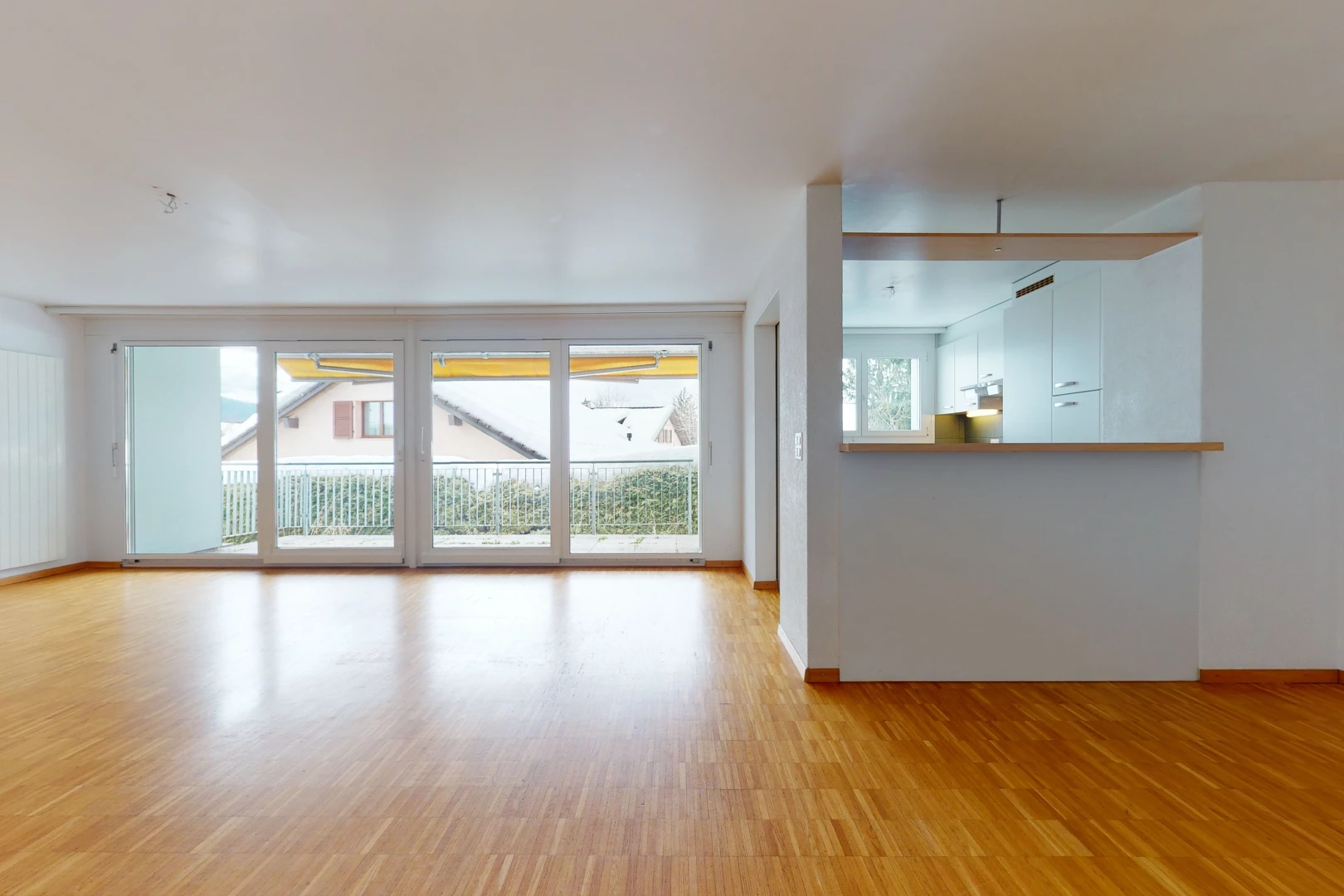living room featuring natural light and wood-type flooring