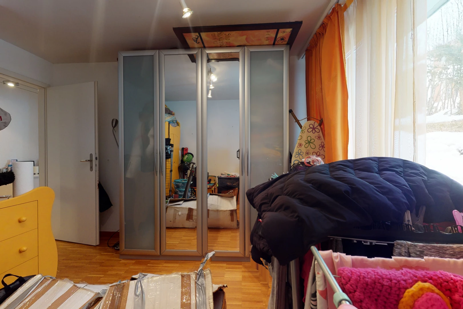 bedroom featuring wood-type flooring and natural light