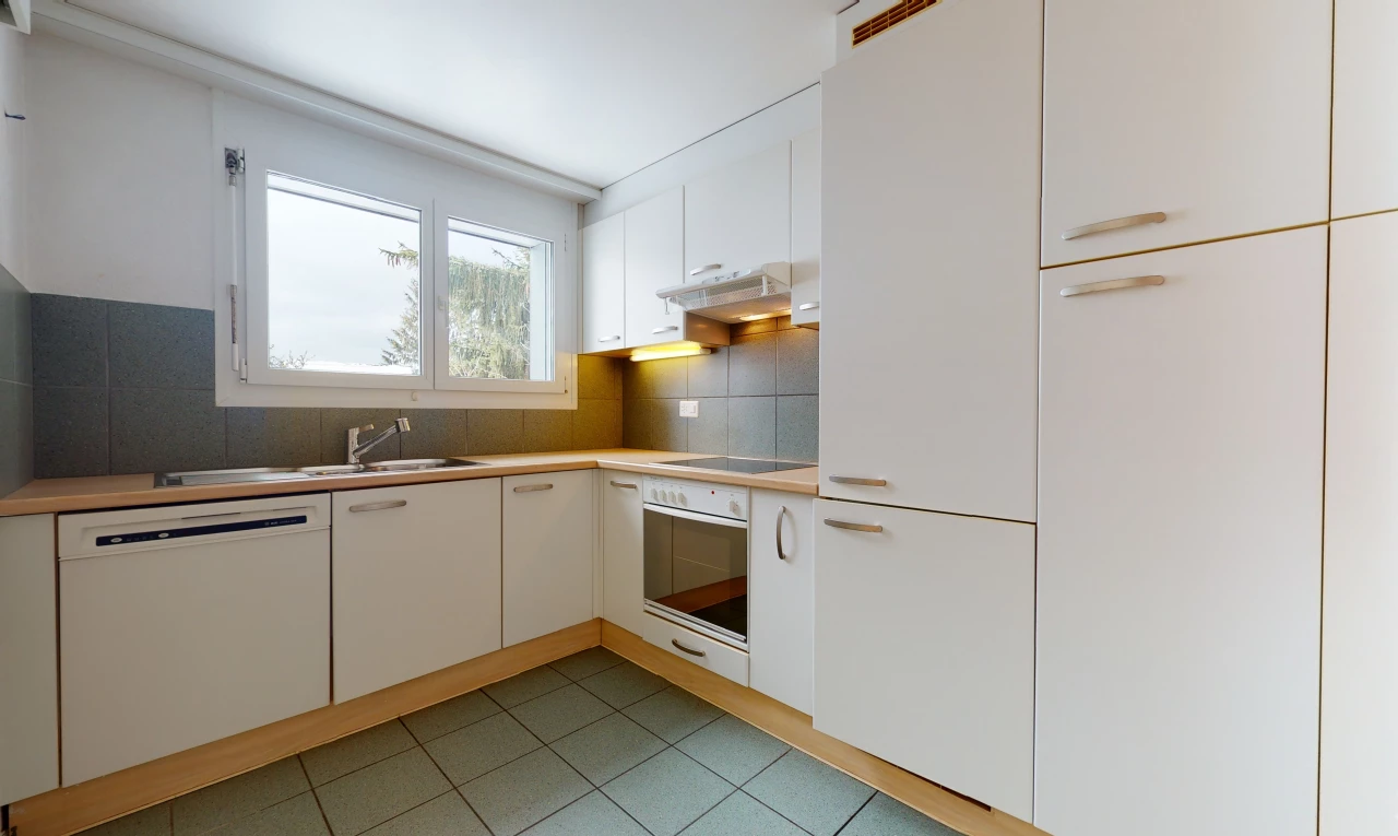 kitchen with natural light, oven, ventilation hood, electric stovetop, dishwasher, light countertops, white cabinetry, and light tile floors