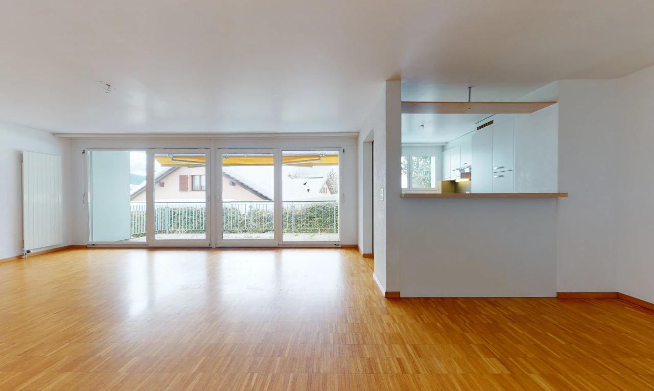 living room featuring natural light and wood-type flooring