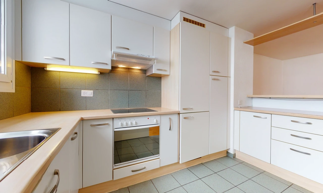 kitchen featuring extractor fan, oven, electric stovetop, light tile floors, white cabinetry, and light countertops