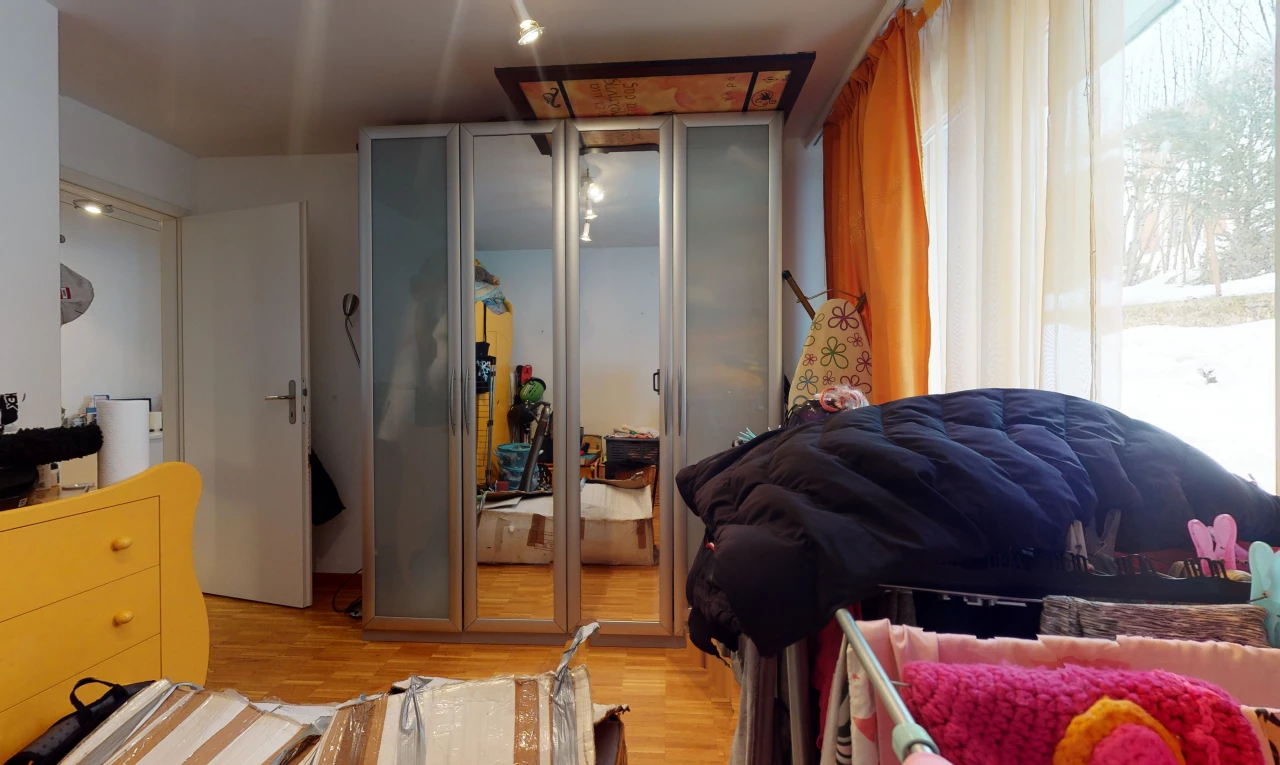 bedroom featuring wood-type flooring and natural light