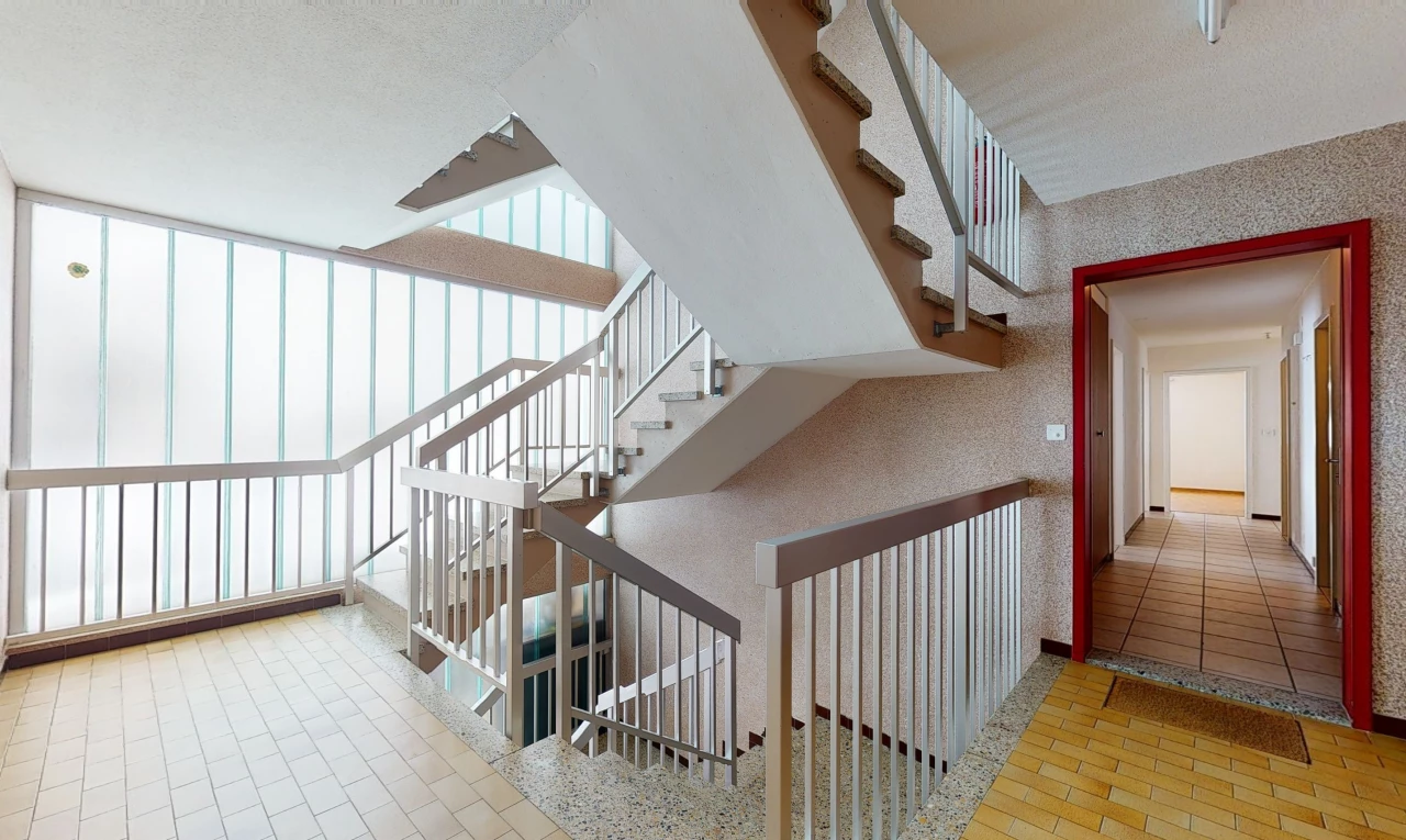 staircase with tile flooring