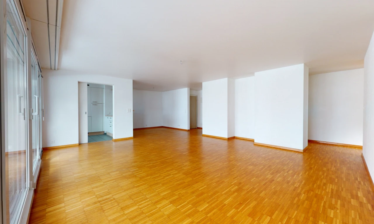 view of hardwood floored empty room