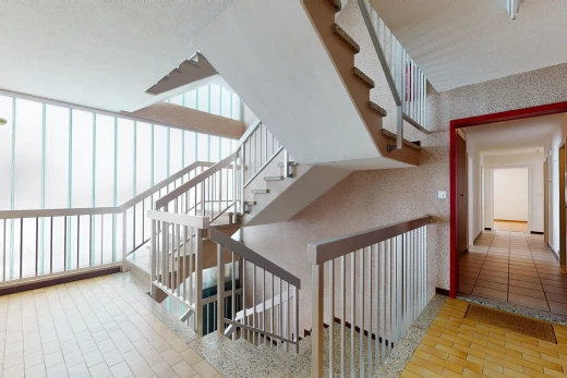 staircase with tile flooring