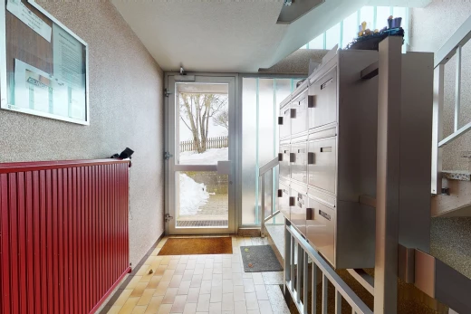mudroom featuring natural light and tile flooring