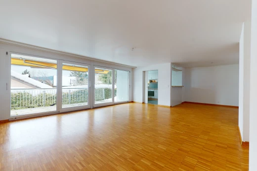 wood floored spare room with natural light