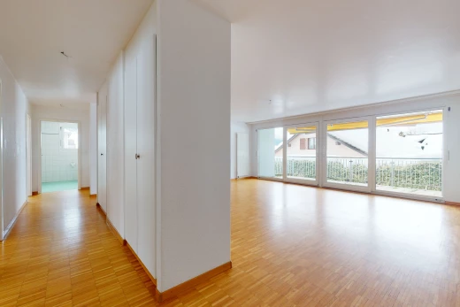 hallway featuring wood-type flooring