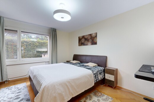 room / bedroom with parquet floors and baseboards