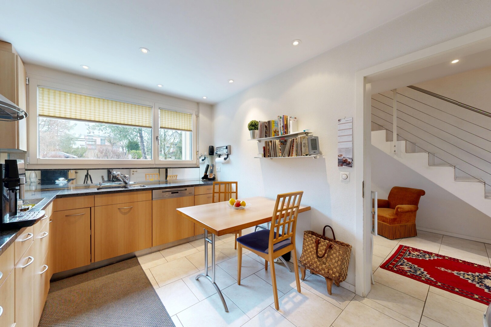 kitchen featuring light tile patterned floors, recessed lighting, dishwasher, dark countertops, and open shelves