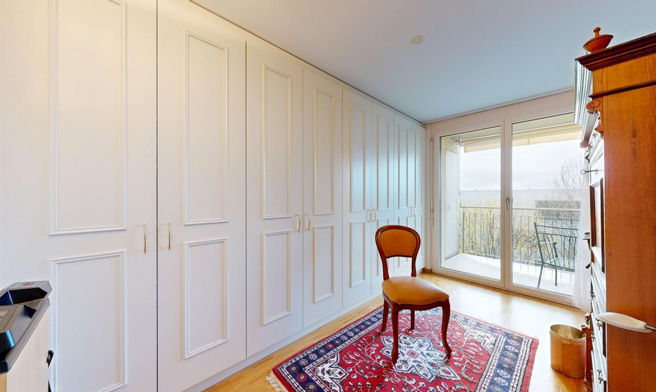 room / bedroom featuring access to exterior and light wood finished floors