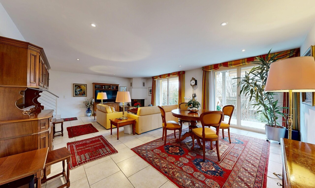 living / dining room featuring light tile patterned floors and recessed lighting