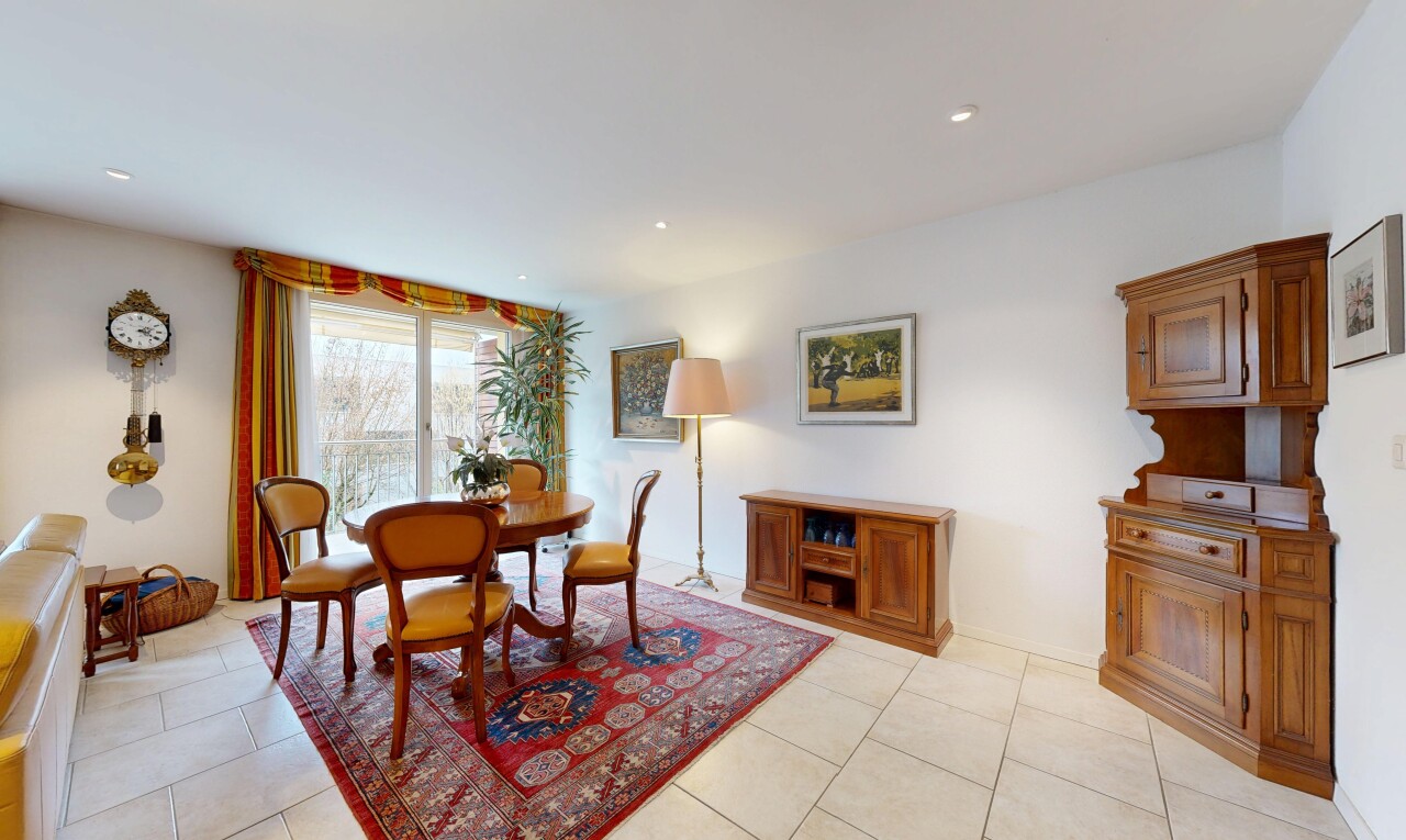 dining space with light tile patterned floors and recessed lighting