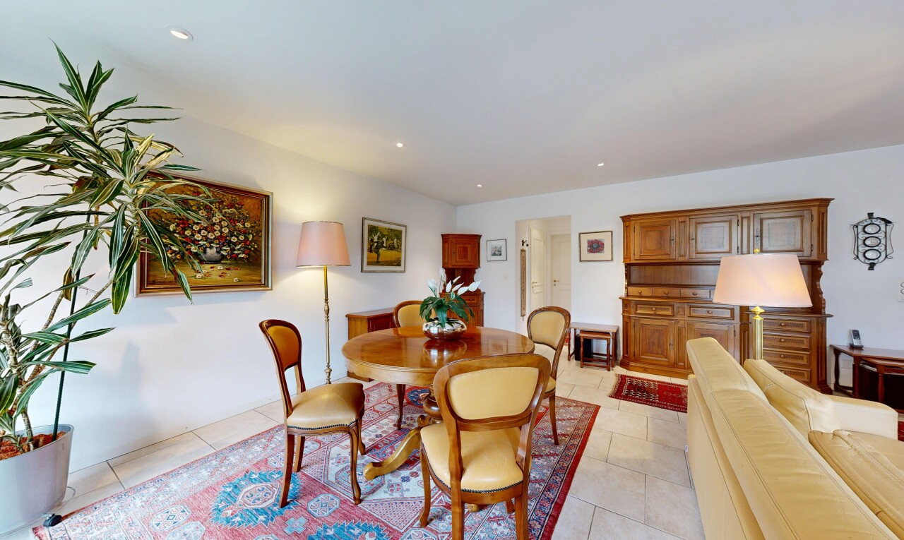 dining room with light tile patterned floors and recessed lighting