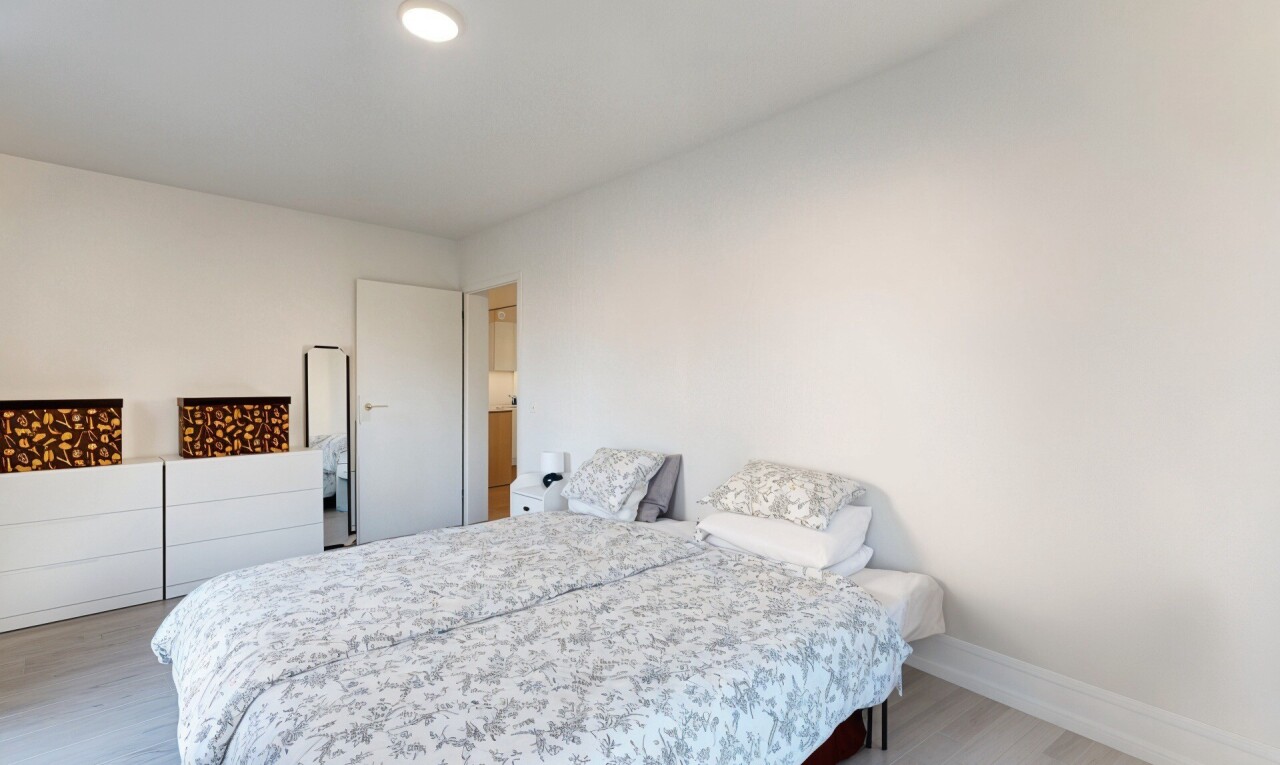 room featuring wood finished floors and baseboards