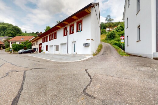 façade avec day time, bardage en stuc, et property visible