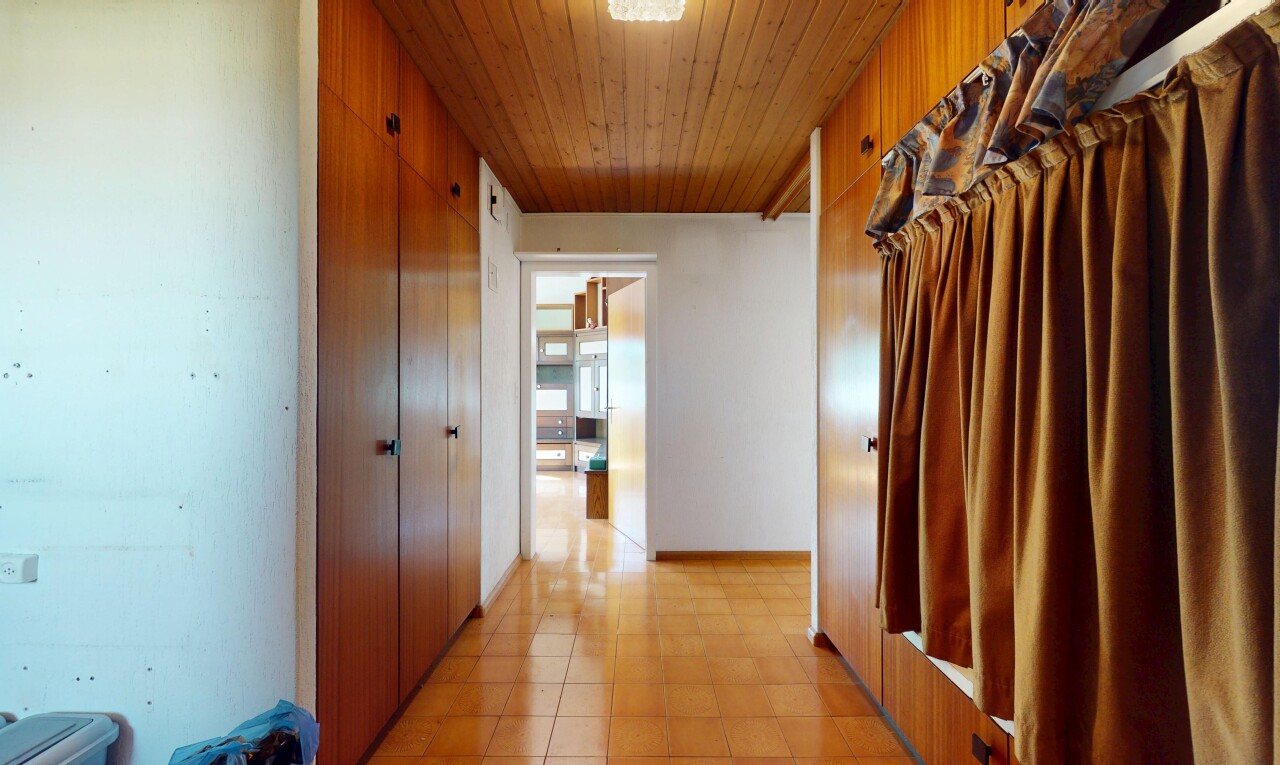 hall with wooden ceiling
