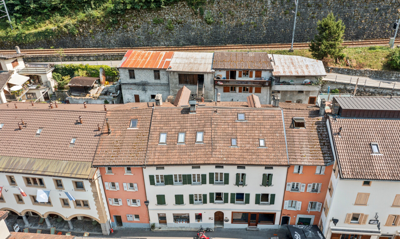 view of property with uncovered parking