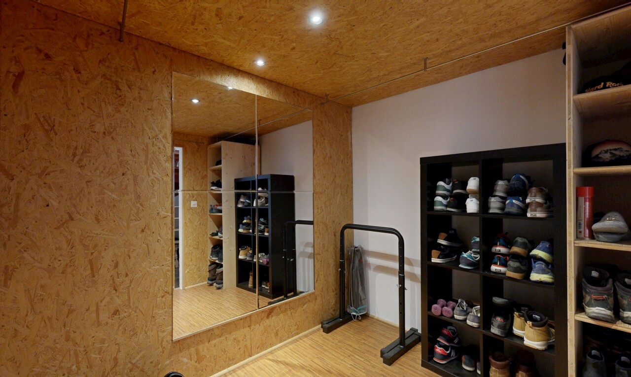 wine cellar featuring wood finished floors and recessed lighting