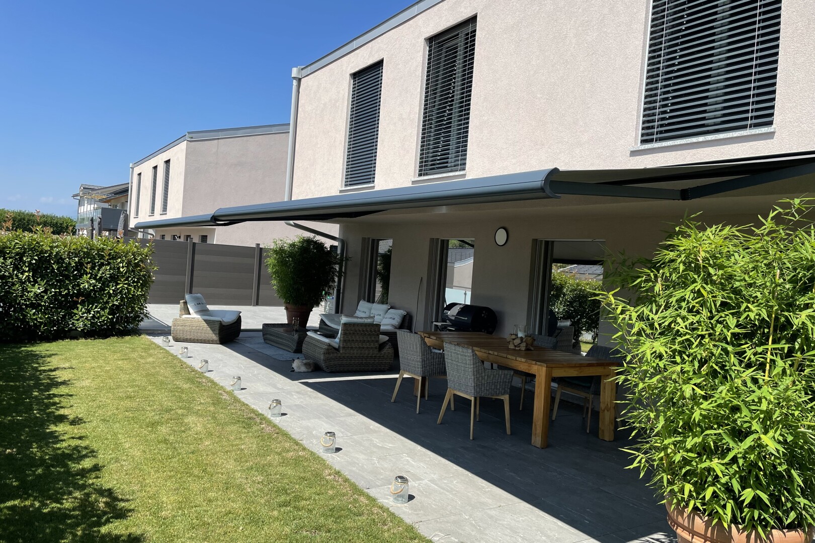 terrace featuring a patio area and an outdoor living / dining area