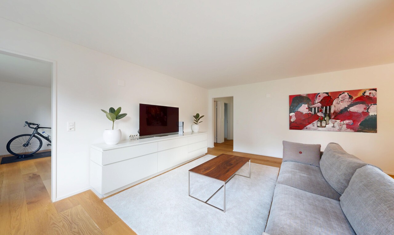 wohnzimmer mit holzfußboden, wood finish floor, gipskartonwand, drywall, und inside property