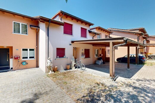 façade avec bardage en stuc, property visible, terrasse, et day time