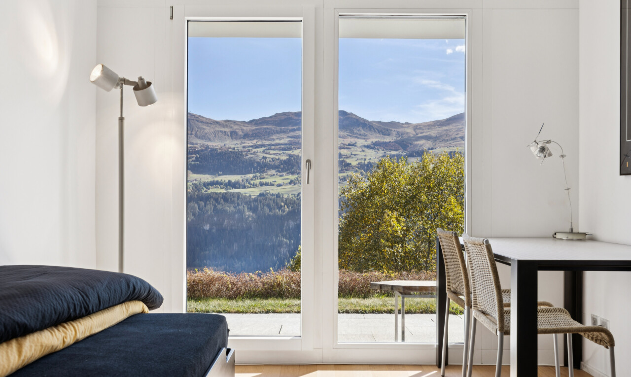 living / dining room with a mountain view