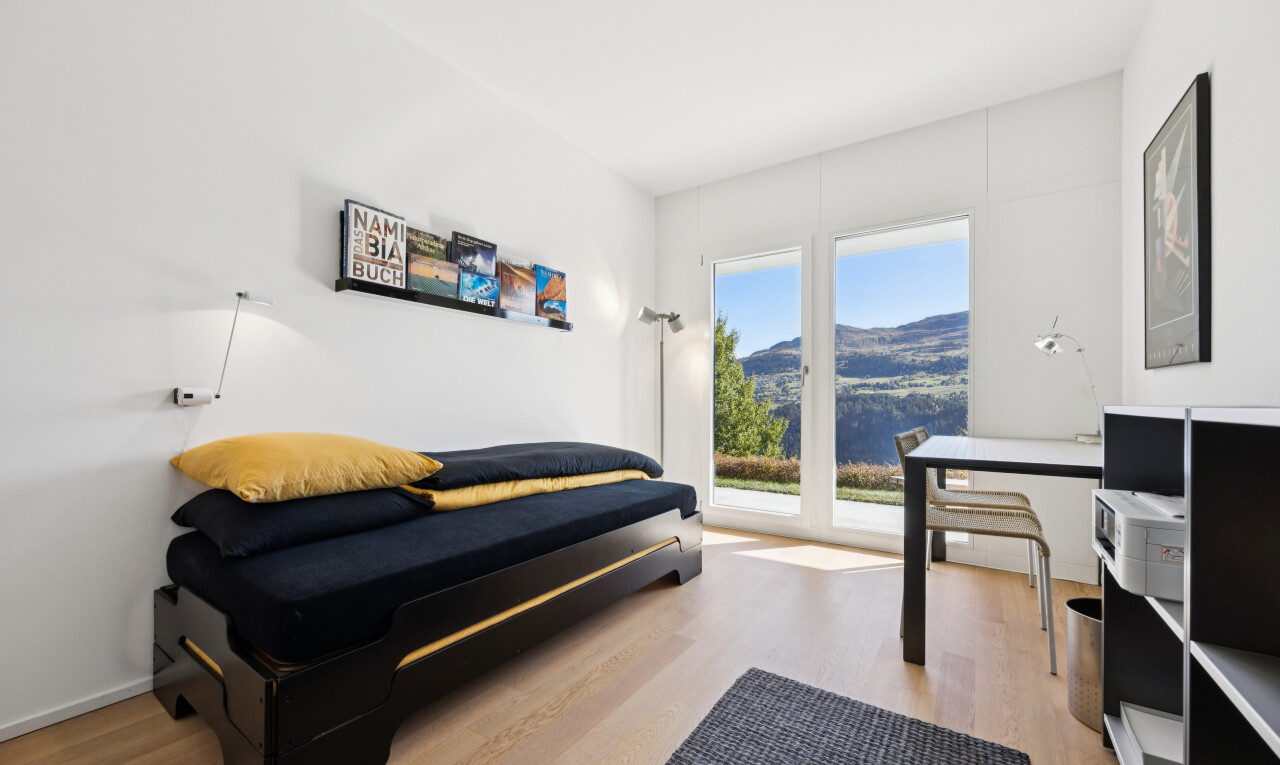 room with access to exterior and light wood-style flooring
