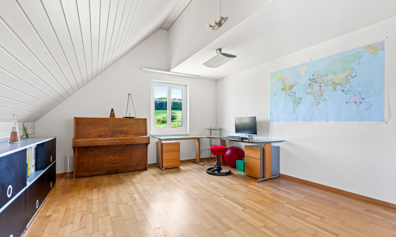 office area featuring light wood-style flooring and a vaulted wooden ceiling