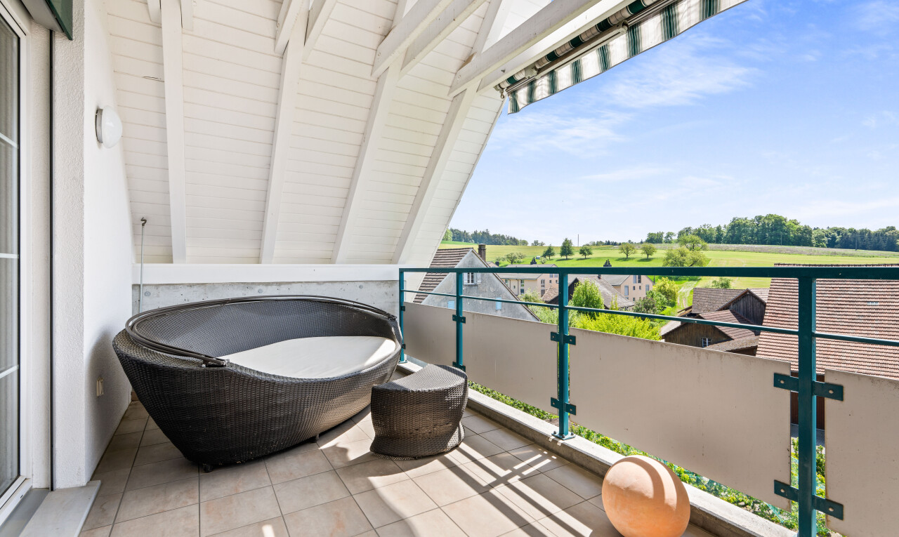 balcony featuring golf course view