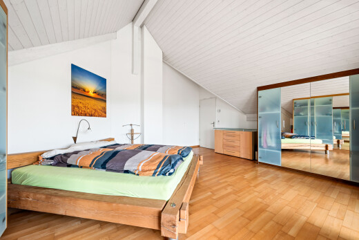 room featuring wood finished floors and beamed ceiling